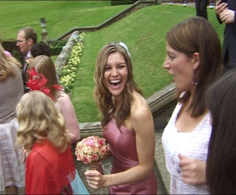 Welcombe Hotel Stratford upon Avon - sharron and mathew laughing on step,wedding video welcombe
